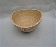 Oval bowl with incrusted bamboo