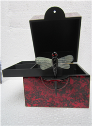 square box with dragonfly key